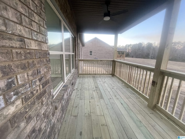 wooden deck with ceiling fan