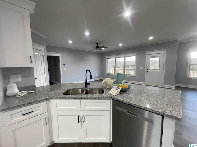 kitchen with ceiling fan, dishwasher, white cabinets, and sink