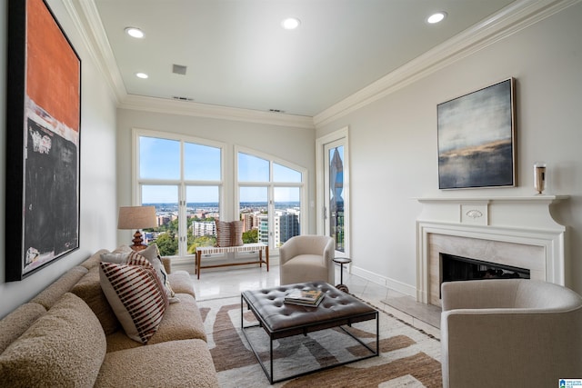 living room featuring crown molding and a high end fireplace