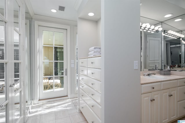 bathroom featuring vanity and tile patterned flooring