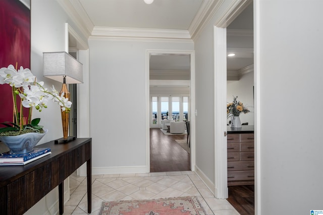 hall featuring ornamental molding and light wood-type flooring