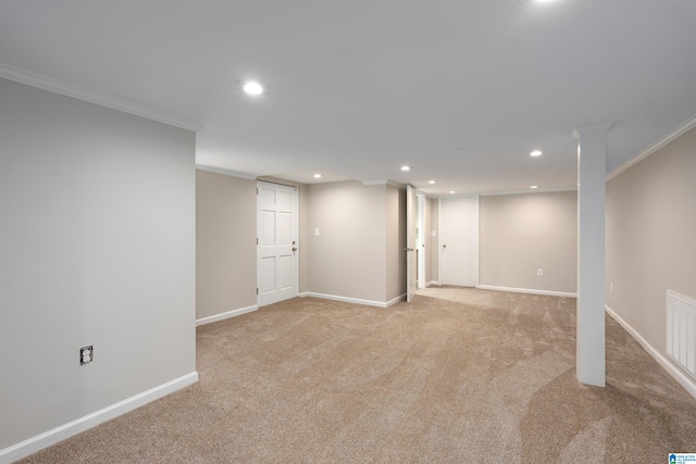 basement with light carpet and ornamental molding