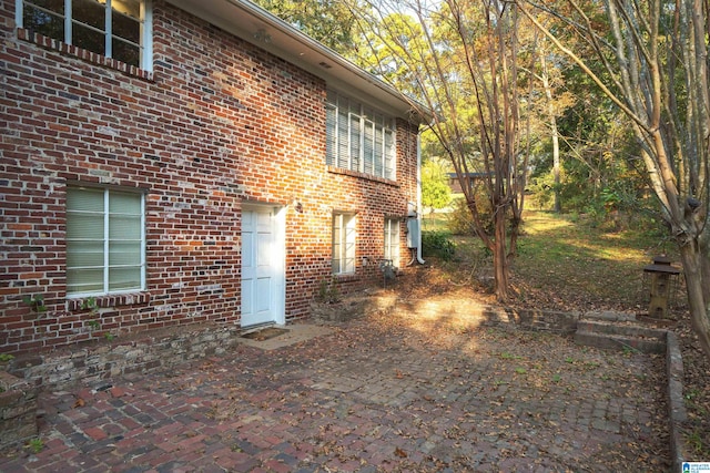 view of home's exterior featuring a patio