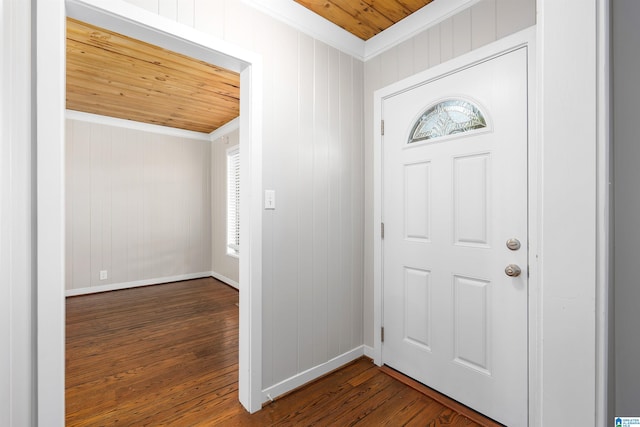 entrance foyer with wooden ceiling, ornamental molding, wooden walls, and dark hardwood / wood-style floors