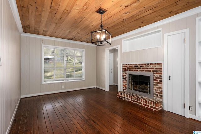 unfurnished living room with crown molding, a fireplace, dark hardwood / wood-style floors, and wooden ceiling