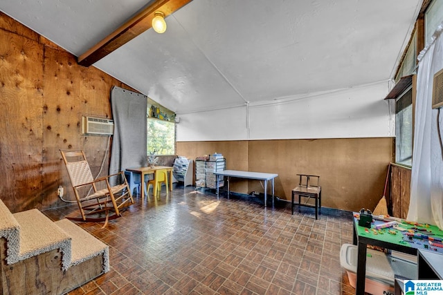 rec room with vaulted ceiling with beams, wood walls, and a wall mounted air conditioner