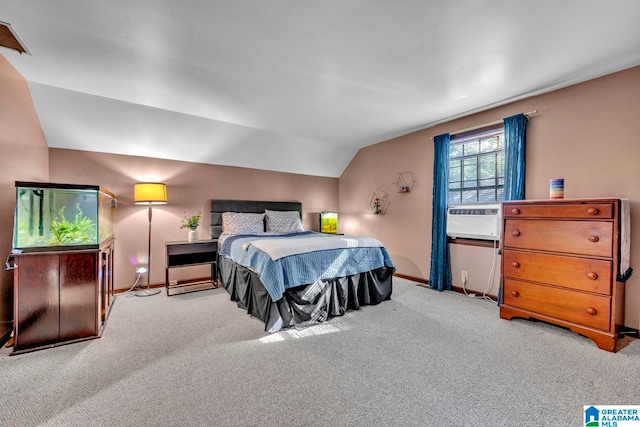 carpeted bedroom with lofted ceiling and cooling unit