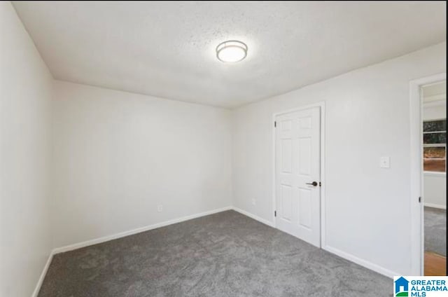 spare room with carpet flooring