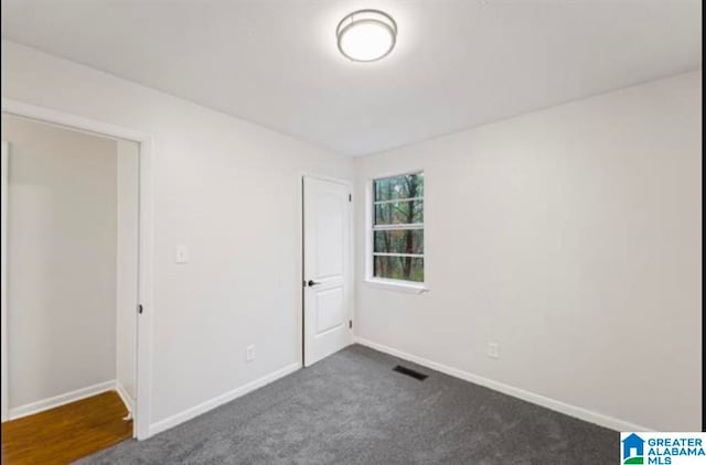 view of carpeted spare room