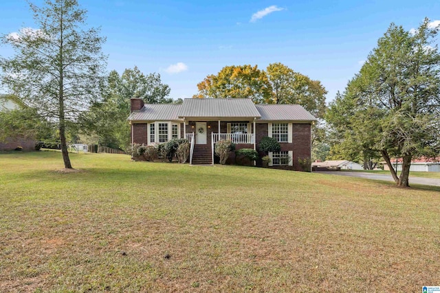 ranch-style house featuring a front yard and a porch