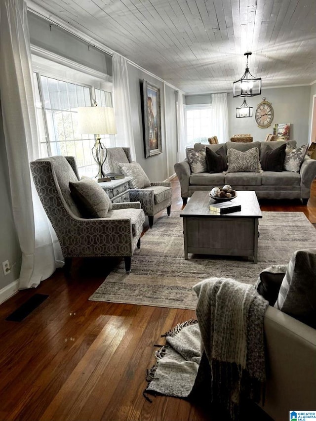 765 2nd Ave, Ashland, AL 36251 - living room featuring crown molding, a chandelier, wood-type flooring, and wooden ceiling