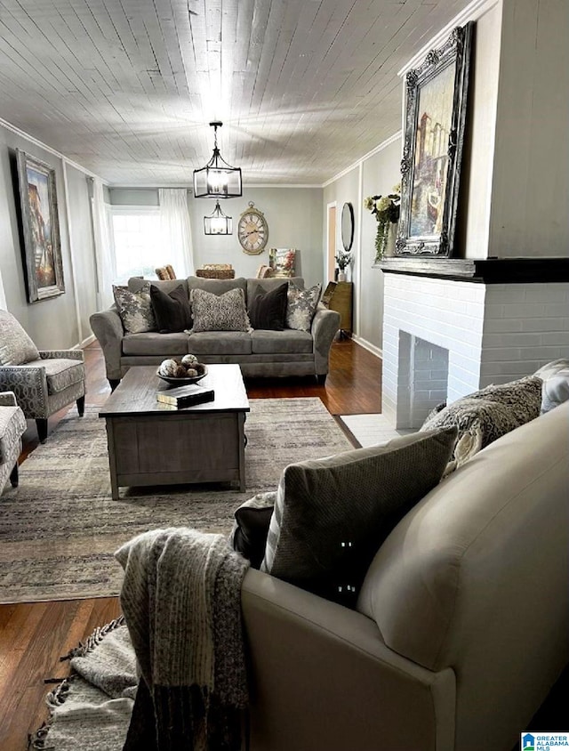 765 2nd Ave, Ashland, AL 36251 - living area with dark wood-type flooring, crown molding, and a chandelier