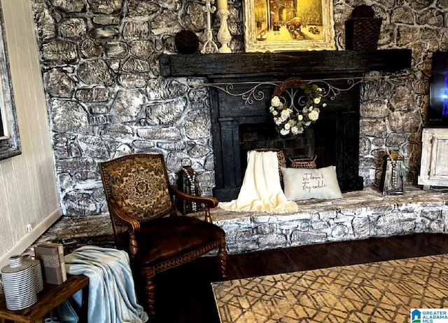 765 2nd Ave, Ashland, AL 36251 - detailed view of a fireplace and wood finished floors