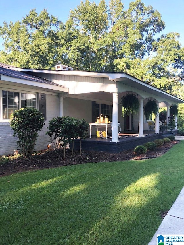 765 2nd Ave, Ashland, AL 36251 - view of home's exterior with a lawn