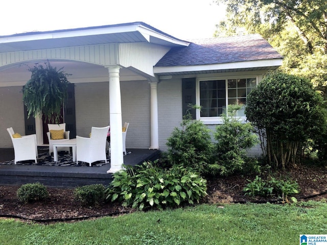 765 2nd Ave, Ashland, AL 36251 - property entrance featuring a porch and brick siding