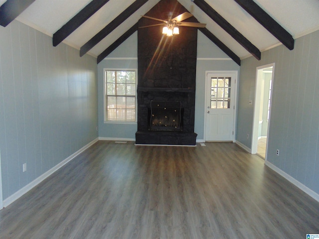 unfurnished living room with vaulted ceiling with beams, ceiling fan, hardwood / wood-style floors, and a fireplace