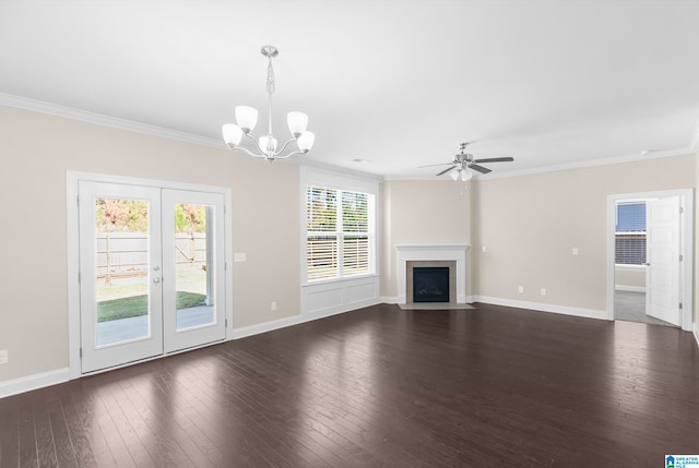 unfurnished living room featuring ornamental molding, dark hardwood / wood-style floors, and ceiling fan with notable chandelier