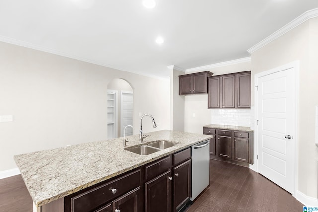 kitchen featuring dishwasher, sink, dark wood-type flooring, crown molding, and a kitchen island with sink