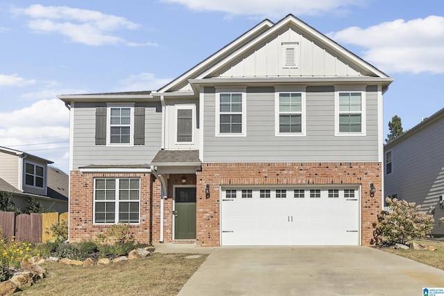 4092 Park Crossings Dr, Chelsea, AL 35043 - view of front facade with brick siding, a garage, driveway, fence, and board and batten siding