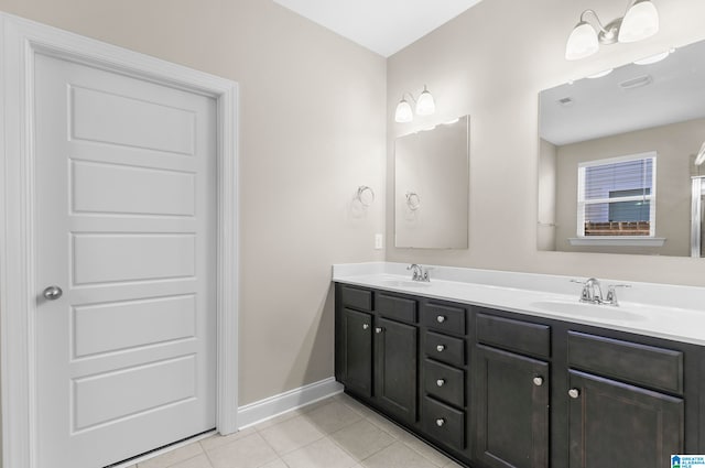 bathroom featuring vanity and tile patterned floors