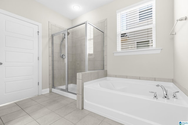 4092 Park Crossings Dr, Chelsea, AL 35043 - bathroom with a stall shower, tile patterned floors, and a bath