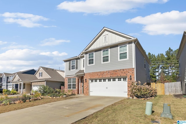 view of front of property with a garage and a front lawn