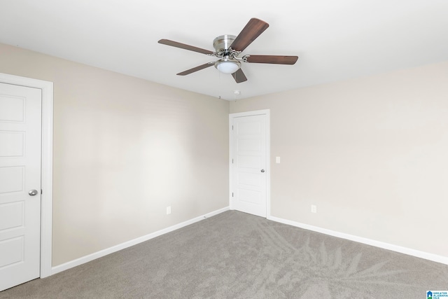 carpeted empty room with ceiling fan