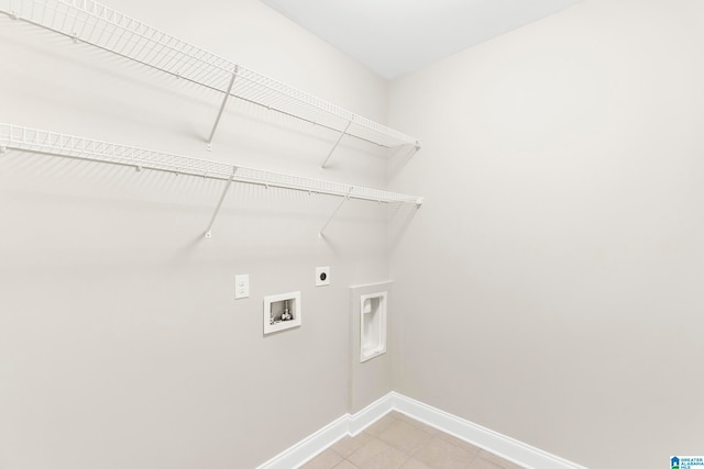 laundry room featuring electric dryer hookup and washer hookup