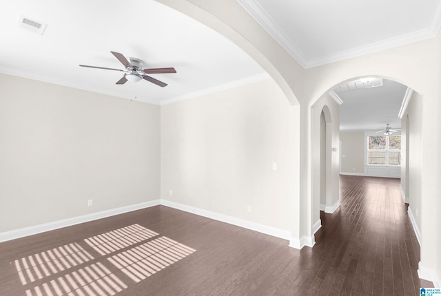 unfurnished room with ceiling fan, ornamental molding, and dark hardwood / wood-style flooring