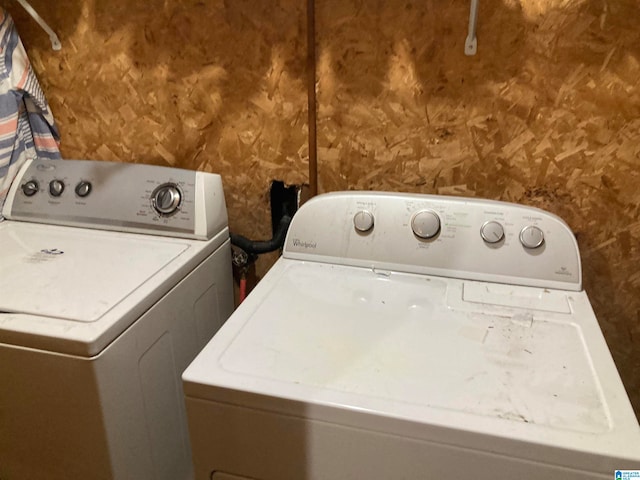 laundry area with washer and clothes dryer