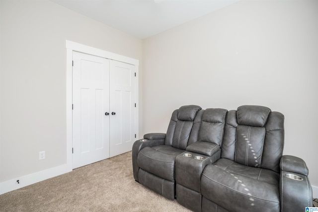 home theater with light colored carpet