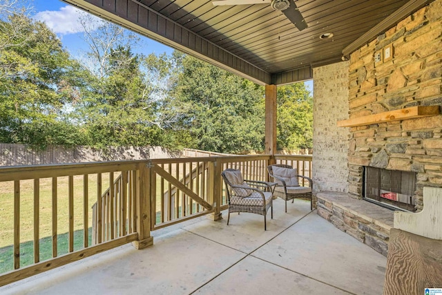 view of patio / terrace with an outdoor stone fireplace