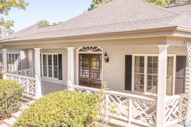 view of exterior entry with a porch