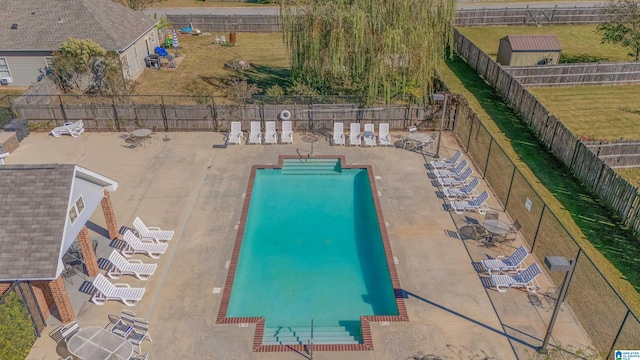 view of pool featuring a patio area