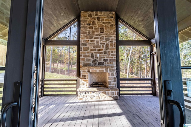 exterior space with an outdoor stone fireplace