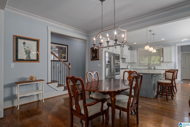 dining room with ornamental molding and dark hardwood / wood-style floors