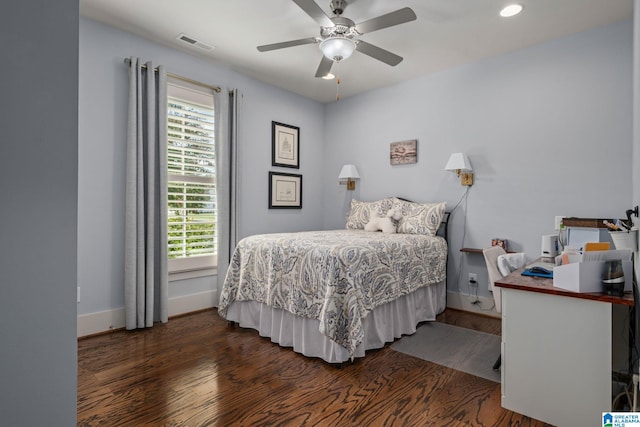 bedroom featuring dark wood-type flooring and ceiling fan