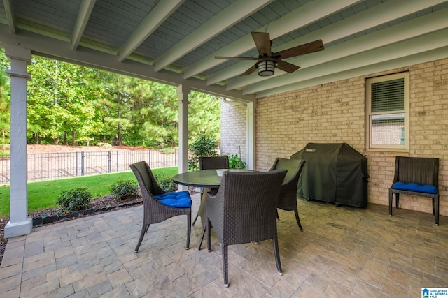 view of patio / terrace featuring area for grilling and ceiling fan