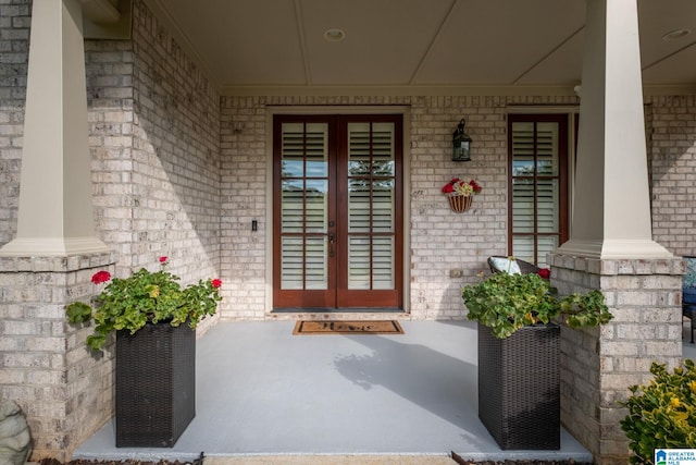 property entrance with french doors and covered porch