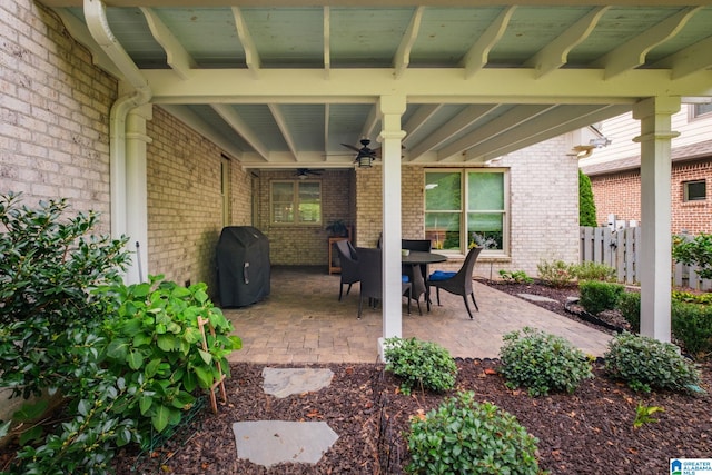 view of patio / terrace featuring area for grilling and ceiling fan