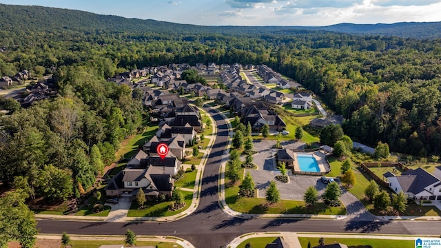 drone / aerial view featuring a mountain view