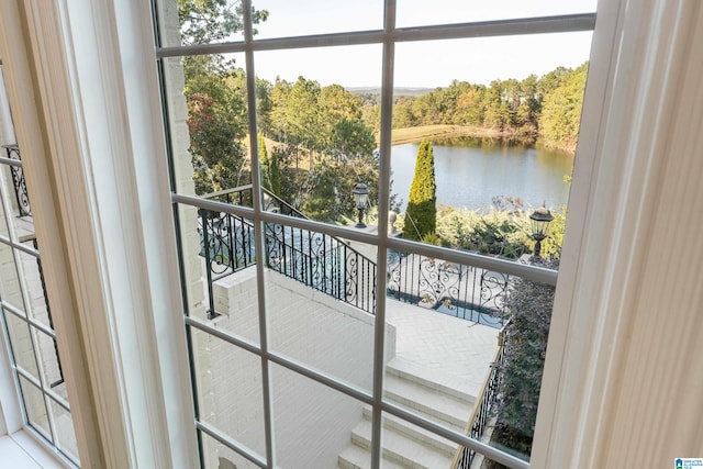 balcony featuring a water view