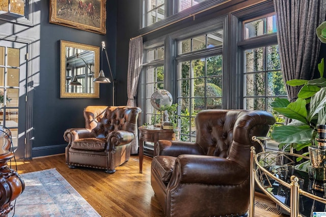 sitting room featuring hardwood / wood-style flooring