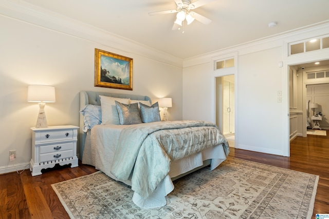 bedroom with dark hardwood / wood-style flooring, ornamental molding, and ceiling fan