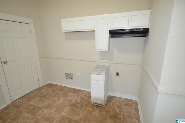 clothes washing area featuring electric dryer hookup