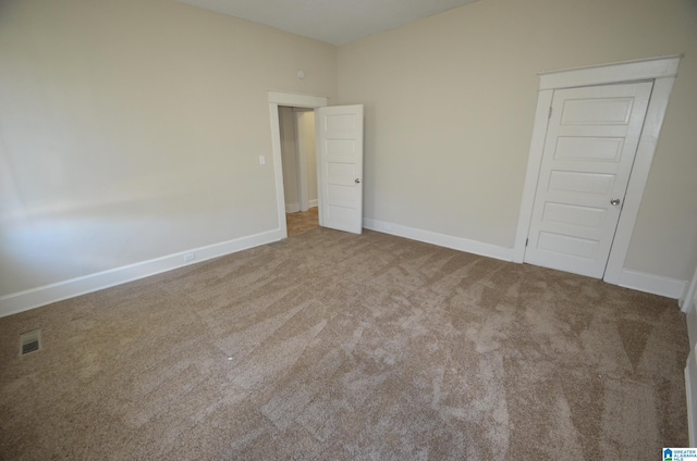 empty room with carpet floors