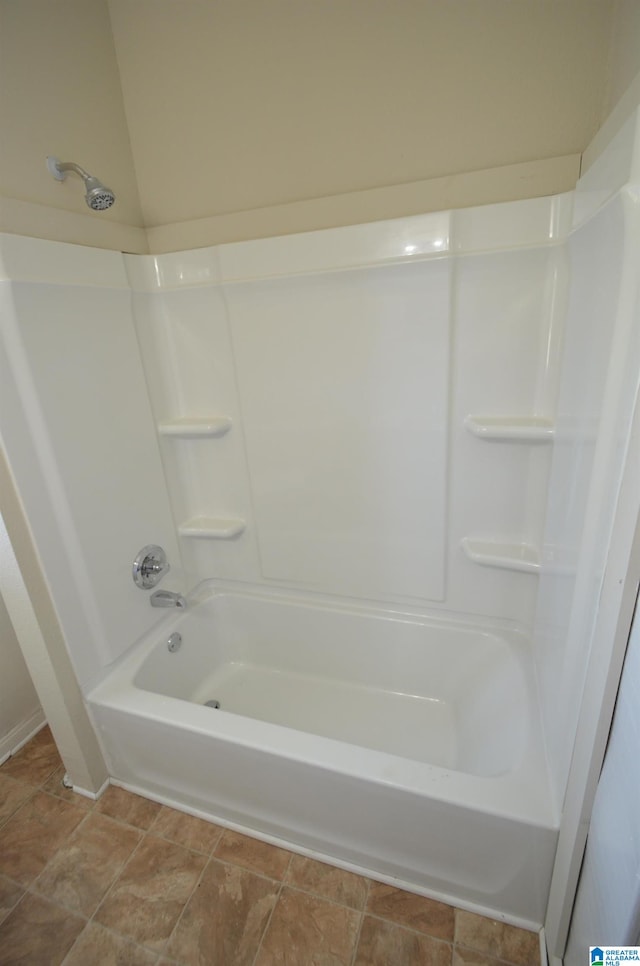 bathroom with shower / tub combination