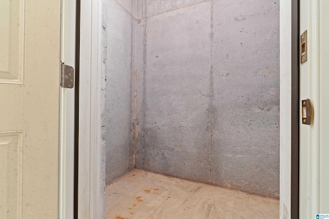 bathroom with concrete floors