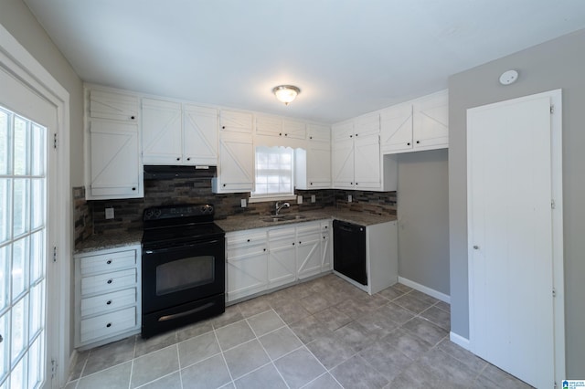 kitchen with decorative backsplash, white cabinetry, black appliances, and sink