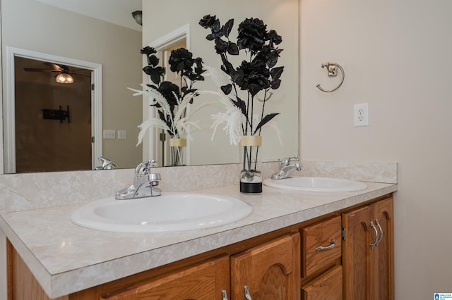 bathroom with vanity and ceiling fan